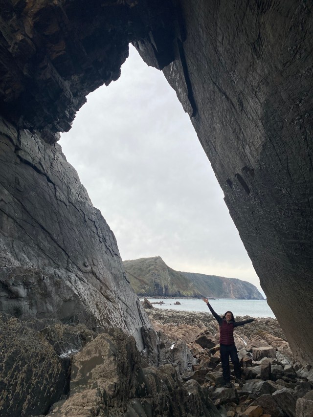 Looking back through Blackchurch Rock whilst walking through it