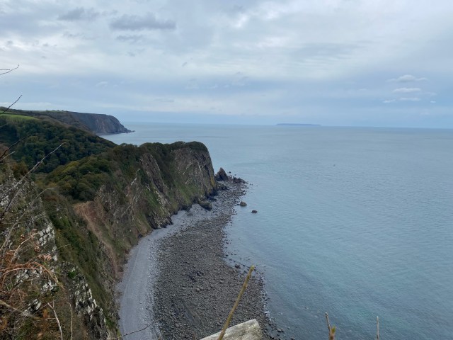 Views of cliffs near Blackchurch Rock and Clovelly, with Lundy Island in the background